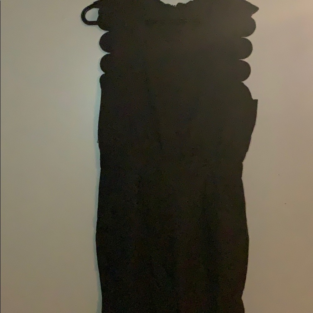 Scallop detailed black jumpsuit